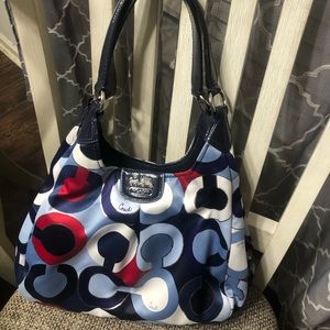 Red white and blue Coach handbag